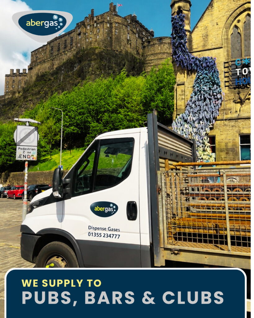 AberGas delivery truck outside a pub in Edinburgh, below the castle